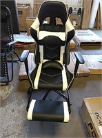 Black and white reclining office chair with foot