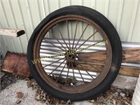 Very large spoked iron wheel