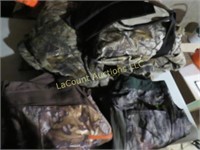 assorted camo clothing under armor pants