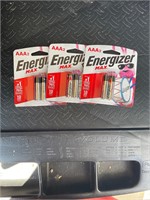 Three packs of AAA batteries.