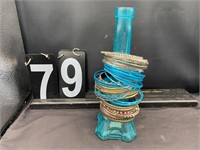 Multi Bracelets On Paris Vase