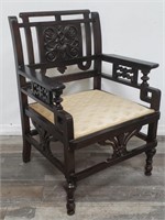 Vintage mahogany carved library chair
