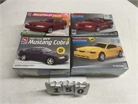 (4) Unopened Ford Mustang Models