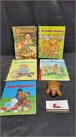 Children's books and wooden turtle