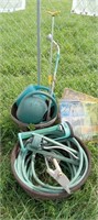 Hoses, soakers and watering cans