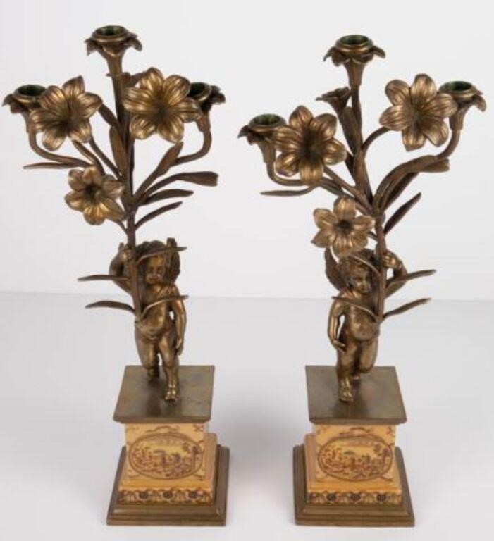 Pair of Patinated Bronze Cherub Floral Candelabra.