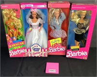 Four Barbie Dolls. NIB