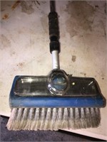 Car wash broom with soap dispenser in it