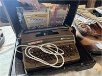 TYPEWRITER WITH CASE AND MORE