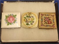 THREE VINTAGE FLORAL COMPACTS