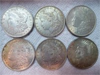 6 silver dollars (5 Morgan ; 1 Peace)