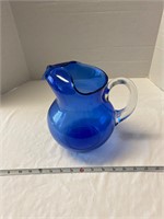 Stained blue glass pitcher