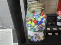 JAR OF OLD MARBLES AND SHOOTERS