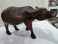 wooden carved bull 12 x8 ( has a crack)