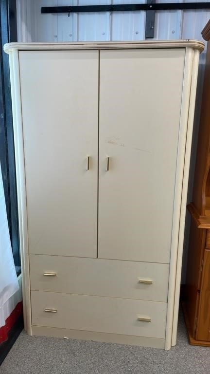 Pressboard armoire (39.5"W x 19"D x 66"H)