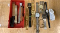 Box lot of wrist watches, including a Arbitron