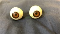 2 human size Eyeballs, appear to be made of some