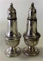 Pr. Weighted sterling shakers,  5" tall (some