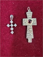 Cross pendants - one is 14K with clear stones