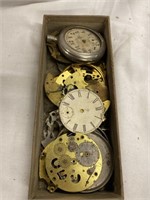 Box of pocket watch parts