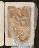 Roman angel figure with box