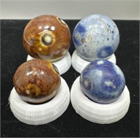 (4) clay Bennington marbles