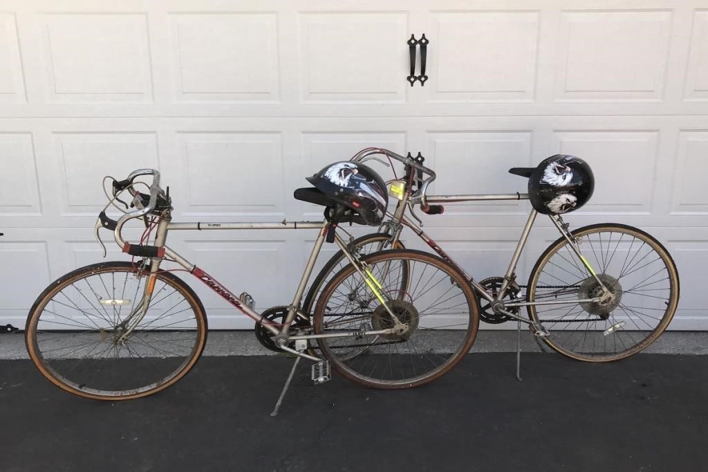 2 - 10 SPEED HUFFY CARRERA BIKES W/ HELMETS