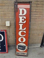 Early Delco Batteries Masonite sign. Wood frame.