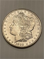 1902 O BU Morgan Silver Dollar