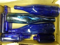 2 boxes blue bottles