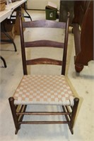 Ladderback Rocking Chair With Checkered Board