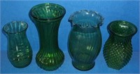 4 green glass vases