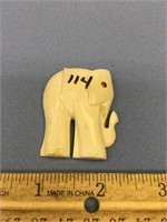 Ivory elephant 2" tall with ruby eye faceted in 14