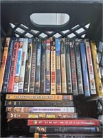 milk crate full of DVDs