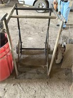 Two wheel barrel stand