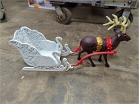 cast iron sled and reindeer