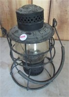 Antique railroad lantern marked M.C.R.R.