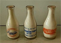 3 glass milk bottles