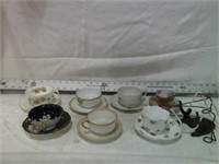 VARIETY OF PORCELAIN TEA CUPS & SAUCERS