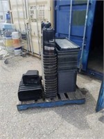 Skid of boot trays and garbage cans