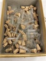 Very small glass bottles with corks