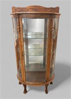 EARLY 20th CENTURY BOW FRONT OAK DISPLAY CABINET