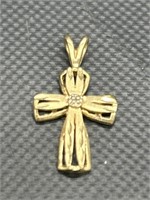 10kt Gold and Diamond Cross Pendant 
TW 1 g