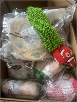 Two boxes of bath sponges, makeup bags, scarf,