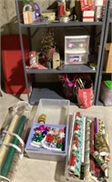 Contents of shelf with Christmas decor, etc.