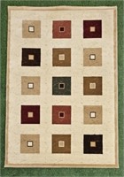 AREA RUG - 91" X 63"