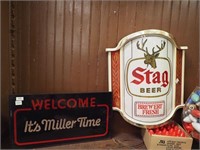 Two lighted beer signs: Welcome, It's Miller