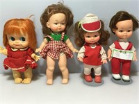 4 vintage dolls.