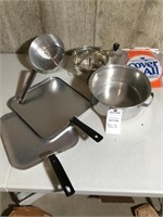 2 griddles; ricer; strainer & steam pot