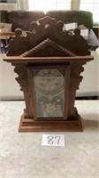 Vintage clock, and 25 inches tall 15 inches wide